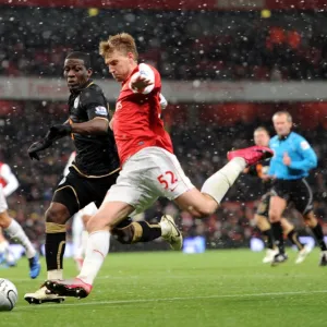 Nicklas Bendtner (Arsenal) Hendry Thomas (Wigan). Arsenal 2: 0 Wigan Athletic