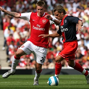 Nicklas Bendtner (Arsenal) Jerome Rothen (PSG)