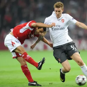 Nicklas Bendtner (Arsenal) Marcos Camozzato (Standard Liege) Nicklas Bendtner (Arsenal) Marcos Camozzato (Standard Liege)