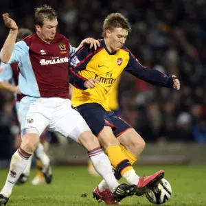 Nicklas Bendtner (Arsenal) Steven Caldwell (Burnley) Nicklas Bendtner (Arsenal) Steven Caldwell (Burnley)