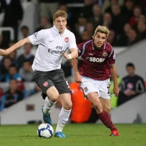 Nicklas Bendtner (Arsenal) Valon Behrami (West Ham) Nicklas Bendtner (Arsenal) Valon Behrami (West Ham)