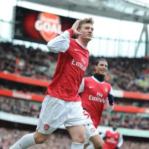Nicklas Bendtner celebrates scoring the 1st Arsenal goal. Arsenal 2: 1 Huddersfield Town