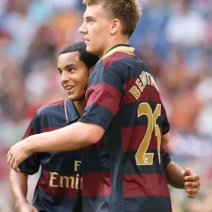 Nicklas Bendtner celebrates scoring Arsenal's first goal with Theo Walcott Nicklas Bendtner celebrates scoring Arsenal's first goal with Theo Walcott