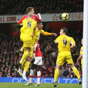 Nicklas Bendtner heads past Cardiff goalkeeper Tom Nicklas Bendtner heads past Cardiff goalkeeper Tom