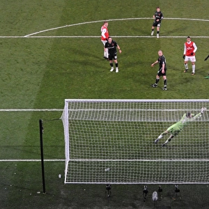 Nicklas Bendtner heads past Orient goalkeeper Jamie Jones to score the 2nd Arsenal goal