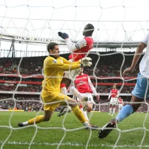 Nicklas Bendtner shoots past Aston Villa goalkeeper Scott Carson and defender Zat Knight to score the Arsenal goal. Arsenal 1: 1 Aston Villa, Barclays Premier League, Emirates Stadium, 1 / 3 / 2008. Credit : Stuart MacFarlane / Arsenal Nicklas Bendtner shoots past Aston Villa goalkeeper Scott Carson and defender Zat Knight to score the Arsenal goal. Arsenal 1: 1 Aston Villa, Barclays Premier League, Emirates Stadium, 1 / 3 / 2008. Credit : Stuart MacFarlane / Arsenal