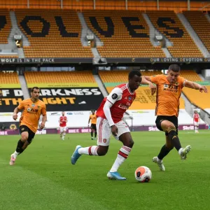 Nketiah vs. Coady: Intense Battle at Molineux - Wolverhampton Wanderers vs. Arsenal FC, Premier League 2019-2020