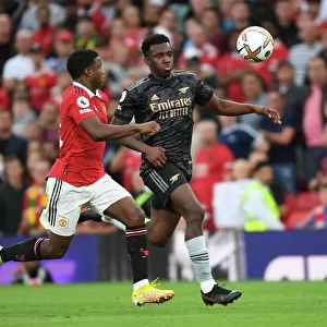 Nketiah vs Malacia: A Premier League Showdown - Arsenal vs Manchester United at Old Trafford (2022-23)