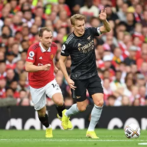 Odegaard Outshines Eriksen: Arsenal's Thrilling Victory Over Manchester United in the Premier League 2022-23