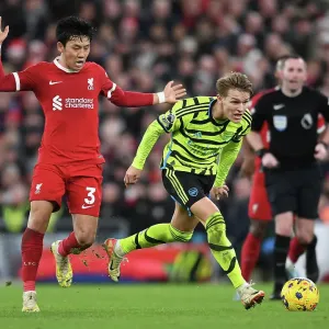 Odegaard vs. Endo: A Premier League Rivalry Erupts at Anfield - Liverpool vs. Arsenal, 2023-24 Odegaard vs. Endo: A Premier League Rivalry Erupts at Anfield - Liverpool vs. Arsenal, 2023-24
