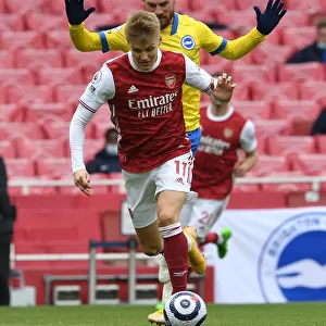 Odegaard vs Mac Allister: A Premier League Battle at Emirates Stadium