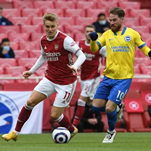 Odegaard vs Mac Allister: A Premier League Showdown at Emirates Stadium (2020-21)