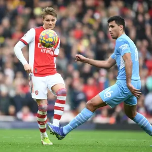 Odegaard vs Rodri: A Premier League Battle at the Emirates
