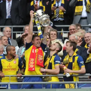 Olivier Giroud with Aaron Ramsey, Nacho Monreal and Arsenal Manager Arsene Wenger Olivier Giroud with Aaron Ramsey, Nacho Monreal and Arsenal Manager Arsene Wenger