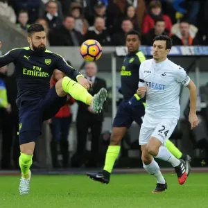 Olivier Giroud (Arsenal) Jack Cork (Swansea). Swansea City 0: 4 Arsenal. Premier League Olivier Giroud (Arsenal) Jack Cork (Swansea). Swansea City 0: 4 Arsenal. Premier League