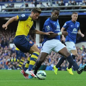 Olivier Giroud (Arsenal) Sylvain Distin (Everton). Everton 2: 2 Arsenal. Barclays Premier League