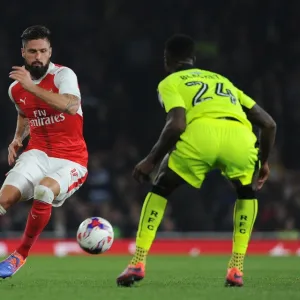 Olivier Giroud (Arsenal) Tyler Blackett (Reading). Arsenal 2: 0 Reading. EFL Cup 4th Round