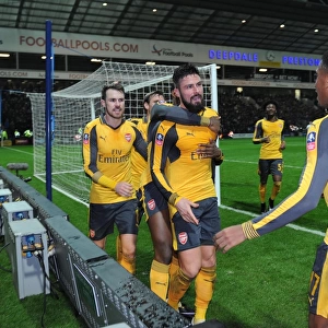 Olivier Giroud celebrates scoring Arsenals 2nd goal with Aaron Ramsey and Alex Iwobi