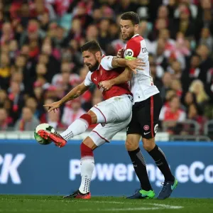 Olivier Giroud vs. Robert Comthwaite: Clash of the Titans in Sydney Football