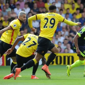 Oxlade-Chamberlain's Star Performance: Arsenal Triumphs 3-1 over Capoue and Watford in Premier League Oxlade-Chamberlain's Star Performance: Arsenal Triumphs 3-1 over Capoue and Watford in Premier League