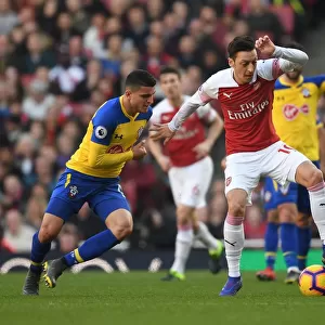 Ozil vs. Elyounoussi: A Battle of Skills in Arsenal vs. Southampton Premier League Clash