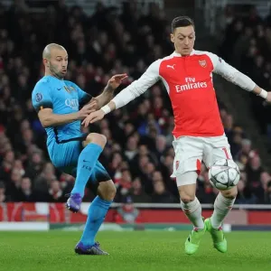 Ozil vs. Mascherano: A Champions League Battle at the Emirates Ozil vs. Mascherano: A Champions League Battle at the Emirates