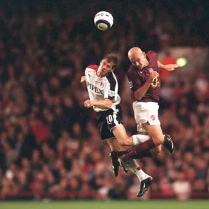 Pascal Cygan (Arsenal) Brian McBride (Fulham). Arsenal 4: 1 Fulham