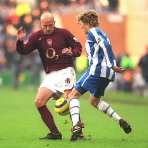 Pascal Cygan (Arsenal) Jimmy Bullard (Wigan)