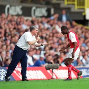 Pat Rice give Lauren instructions during the match. Tottenham Hotsour v Arsenal