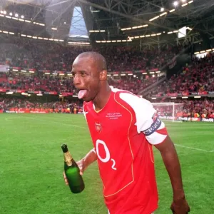 Patrick Vieira (Arsenal) celebrates with some Champagne after the match Patrick Vieira (Arsenal) celebrates with some Champagne after the match