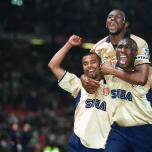 Patrick Vieira, Ashley Cole and Sol Campbell celebrate the Arsenal Championship victory after the ma