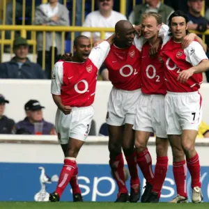 Patrick Vieira celebrates scoring Arsenals 1st goal with Robert Pires