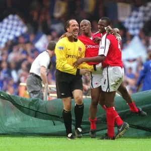 Patrick Vieira, Sylvain Wiltord and David Seaman celebrate after the final whistle Patrick Vieira, Sylvain Wiltord and David Seaman celebrate after the final whistle
