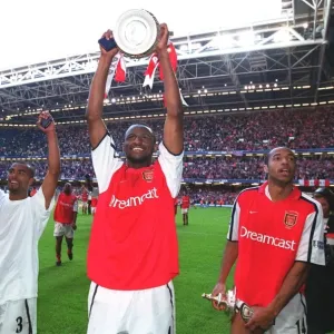 Patrick Vieira, Thierry Henry and Ashley Cole celebrate after the match Patrick Vieira, Thierry Henry and Ashley Cole celebrate after the match