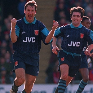 Paul Merson celebrates scoring a goal for Arsenal with Eddie McGoldrick