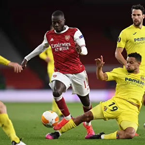 Pepe vs. Coquelin: A Riveting Rivalry in Empty Emirates Stadium - Arsenal vs. Villarreal UEFA Europa League Semi-Final Clash