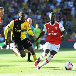 Pepe vs Doucoure: Intense Moment from Watford vs Arsenal Premier League Clash