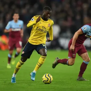 Pepe vs Noble: A Premier League Showdown - Arsenal's Pepe Clashes with West Ham's Noble (December 2019)