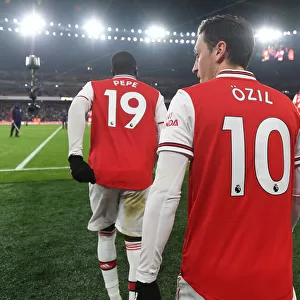 Pepe vs Ozil: A Star-Studded Showdown at Arsenal's Battle against Manchester United (2019-20)
