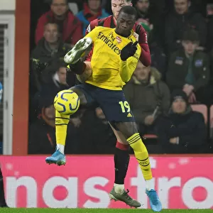 Pepe vs Simpson: Intense Clash in the Premier League - AFC Bournemouth vs Arsenal FC (December 2019)