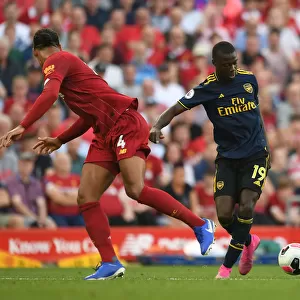 Pepe vs. Van Dijk: A Premier League Showdown - Liverpool vs. Arsenal, 2019-20