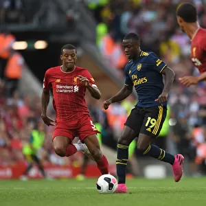 Pepe vs Wijnaldum: A Premier League Battle at Anfield, 2019