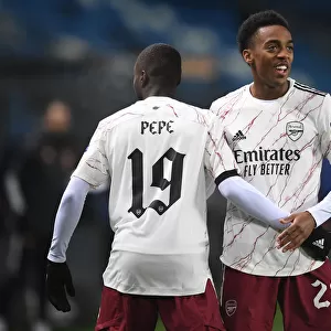 Pepe and Willock Celebrate Arsenal's First Goal Against Molde in Europa League