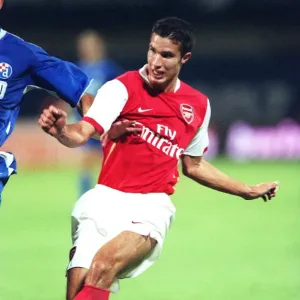 Persie shoots past Zagreb goalkeeper Ivan Turina Persie shoots past Zagreb goalkeeper Ivan Turina