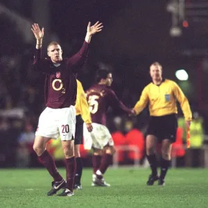Philippe Senderos waves to the fans at the end of the match
