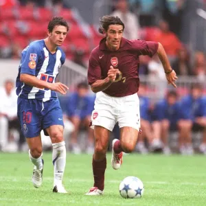 Pires and Postiga in Action: Arsenal's Victory over Porto at the Amsterdam Tournament, 2005 Pires and Postiga in Action: Arsenal's Victory over Porto at the Amsterdam Tournament, 2005