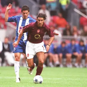 Pires and Postiga Clash: Arsenal's Victory over Porto in the Amsterdam Tournament (31/7/05) Pires and Postiga Clash: Arsenal's Victory over Porto in the Amsterdam Tournament (31/7/05)