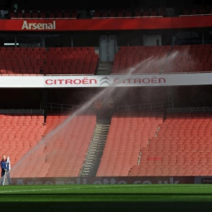 The pitch is watered before the match. Arsenal 2: 0 Middlesbrough. FA Cup 5th Round