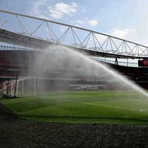 The pitch is watered before the match. Arsenal 4: 0 Watford. Barclays Premier League