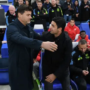 Pochettino and Arteta Embrace Before Chelsea vs. Arsenal Premier League Clash (2023-24)